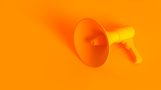 Portable wireless megaphone. Conceptual stereoscopic image full toned in orange color.