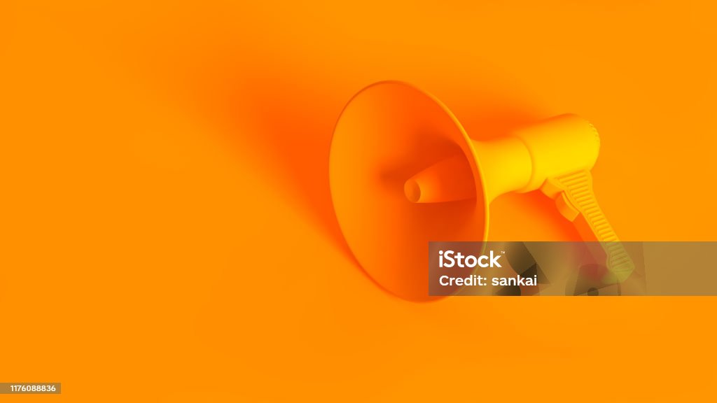 Portable wireless megaphone. Conceptual stereoscopic image full toned in orange color. Marketing Stock Photo
