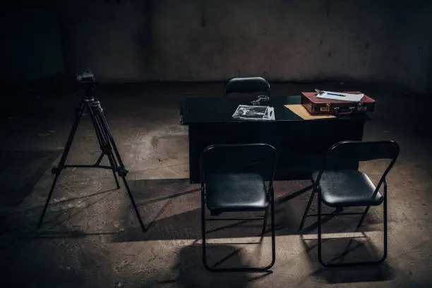 Interrogation Room with Chairs and Table