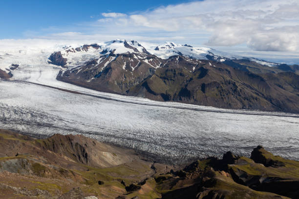 istock Skaftafellsjokull glacial river going down the volcano mountain. 1176090980