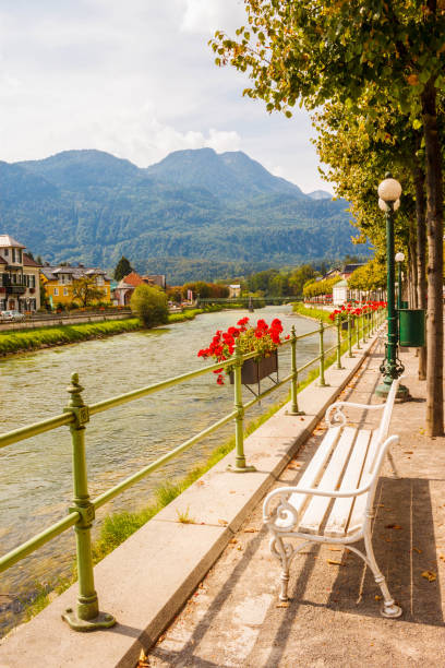 Bench on the riverside esplanade in Bad Ischl, Austria.