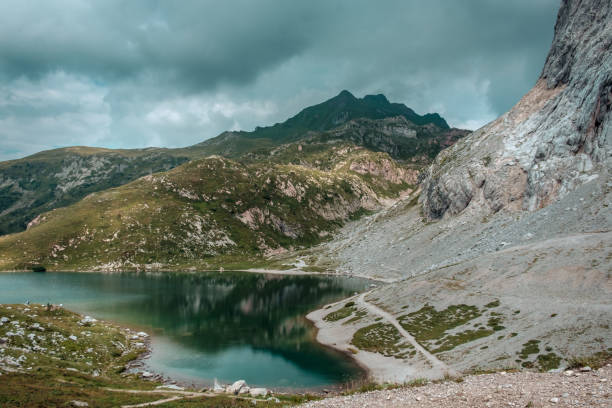 istock The Volaia lake in a cloudy summer day 1176102815