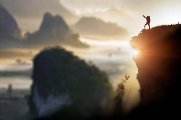 istock Male hikers climbing 1176103487
