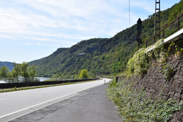 istock waterfront road in lower Moselle valley 1176103548
