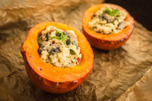 istock Two halves of a baked orange pumpkin 1176103761