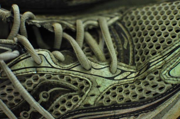 istock Mens silver, white and blue trainer texture close up. 1176104018