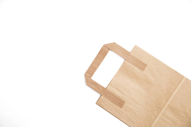 istock biodegradable environmentally friendly cardboard bag on white isolated background 1176104330