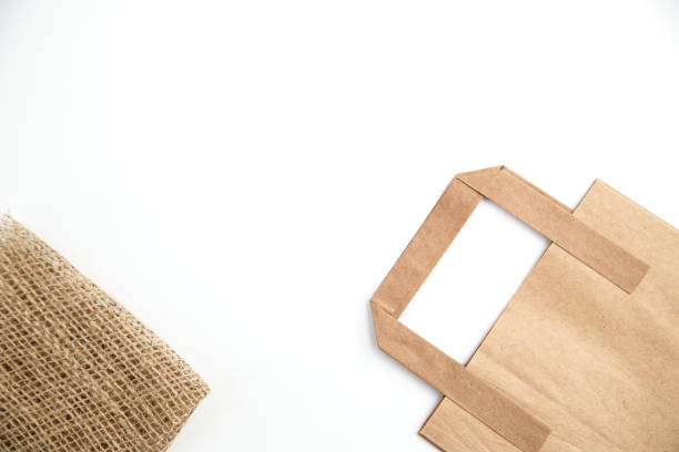 istock biodegradable environmentally friendly cardboard bag on white isolated background 1176105315