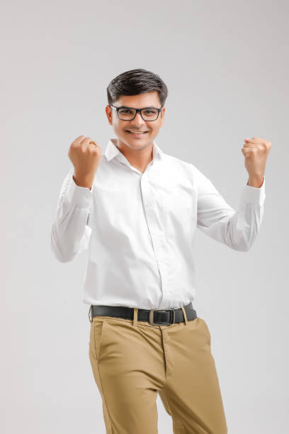 istock Happy young Indian man over white background 1176106542