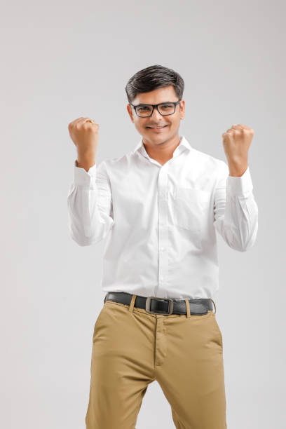 istock Happy young Indian man over white background 1176106653