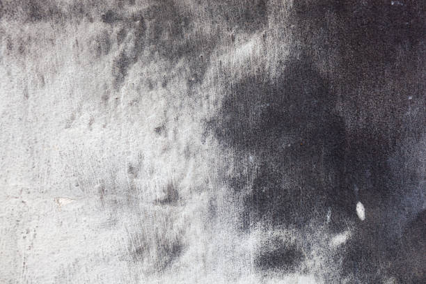 istock Texture of a concrete wall with cracks and scratches which can be used as a background 1176106929