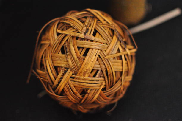Braided geometric ball of wicker.