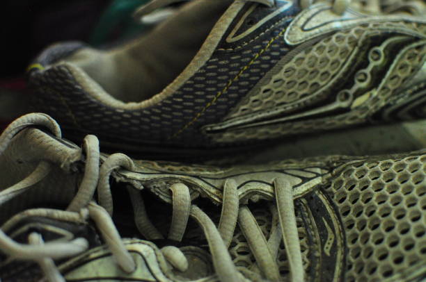 istock Mens silver, white and blue trainer texture close up. 1176111585