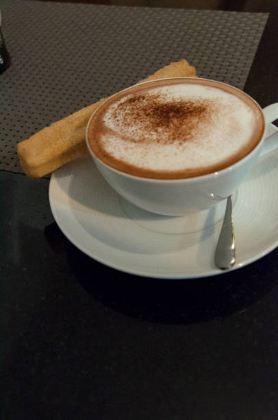 istock Churros con chocolate served in a restaurant. 1176111699