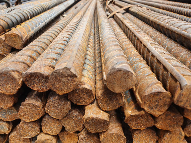 istock Close-up pile of rusty steel bar background 1176112129