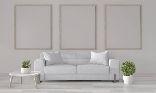 istock Mock up poster frame on white wall with white sofa on modern room interior.3D rendering 1176114126