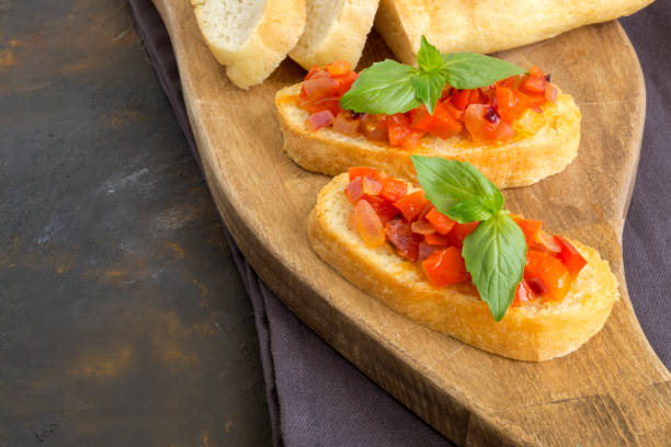istock traditional Italian bruschetta with tomatoes, pepper and Basil 1176117712