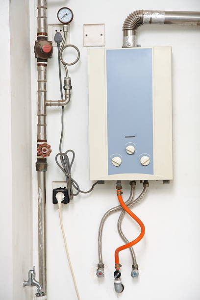 tankless esquentador de água quente - gas boiler imagens e fotografias de stock
