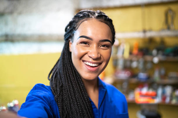 istock Mechanic taking a selfie in auto repair shop 1176126777