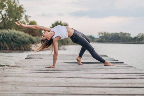 istock Blonde woman exercising yoga 1176129230