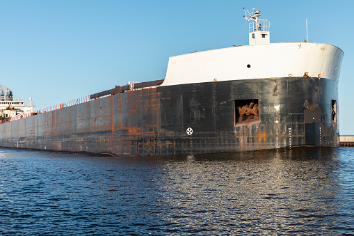 A ship in a canal on Lake Superior.