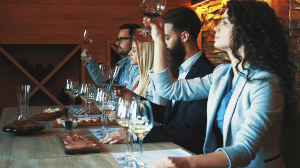 istock Friends tasting wine together 1176134604