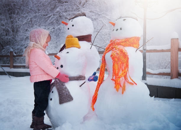 istock Girl Playing and Enjoying Winter 1176136726