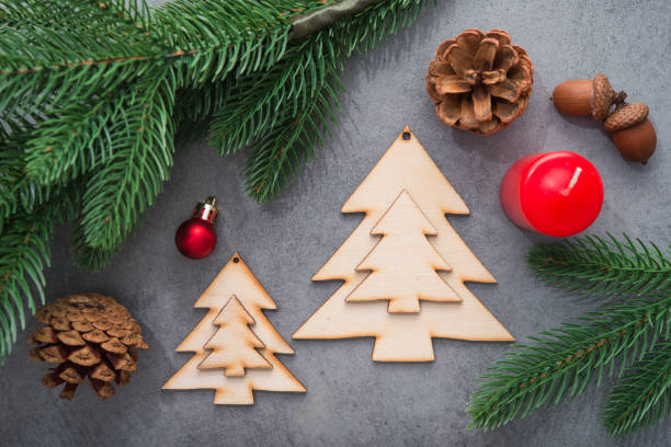 istock Decor wooden fir tree with branches on a stone background 1176137917