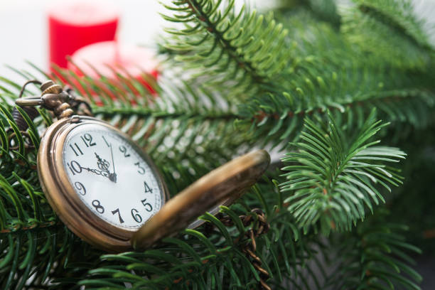 istock The golden clock, whose arrow are about twelve o'clock New Year celebration 1176138343