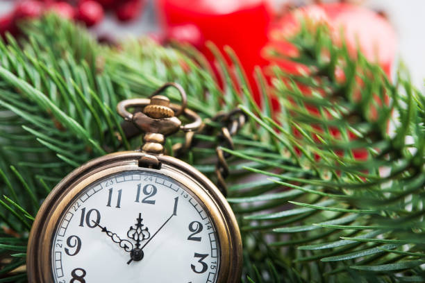 istock The golden clock, whose arrow are about twelve o'clock New Year celebration 1176138352