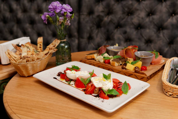 caprese salad and set of appetizers - caprese salad salad restaurant vinegar imagens e fotografias de stock