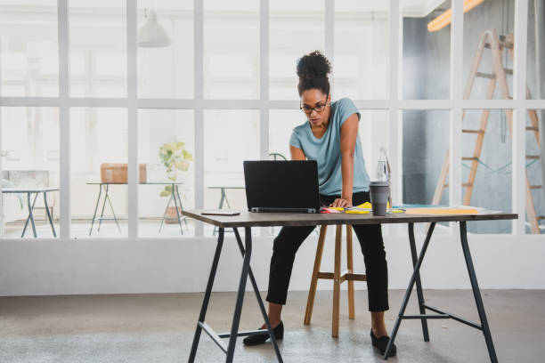 istock African businesswoman working in the office and using laptop 1176144205
