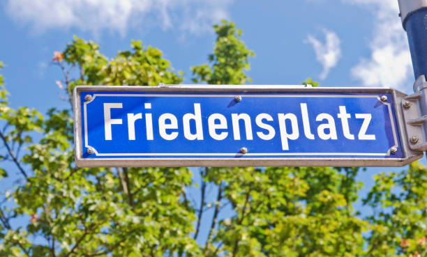istock Street sign in Dortmund-Germany. Peace Square in German language 1176144490