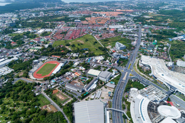 istock Drones Aerial View top down of road junction from above Image for transportation background,automobile traffic of many cars in phuket city 1176145812