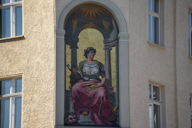 Antic mosaic in a building corner in Berlin Mitte portraying a greek or roman lawmaker.