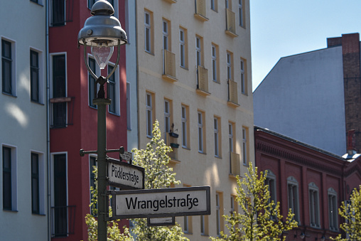 Street lamp pole with the street signs for Wrangelstraße and & Pücklerstraße, in Kreuzberg, Berlin