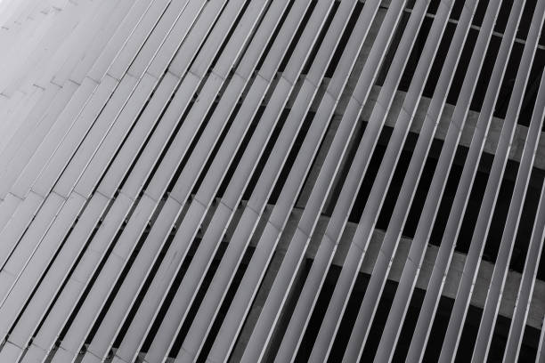 istock Shaped metal surface made of thin lines joined together. 1176153040