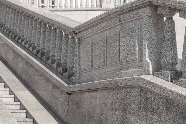 istock Classic granite tile staircase with balustrade in daylight 1176153954