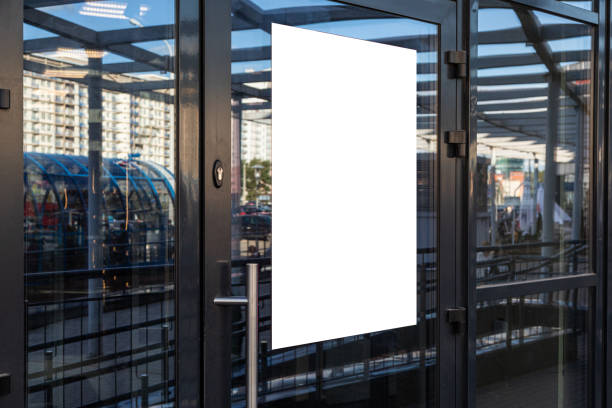 istock Glass door of ofiice building with white empty panel 1176153979