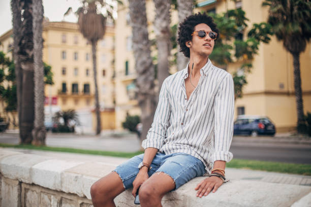 istock Guy listening to music and looking away 1176160470