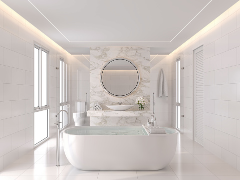 Luxurious white bathroom modern style 3d render. The room has white tiles and the wall is decorated with marble at the back of the basin wall. There is a large window of natural light into the room.