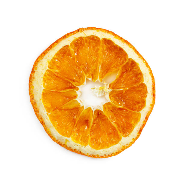 istock Slice of dried orange isolated on white 1176166058