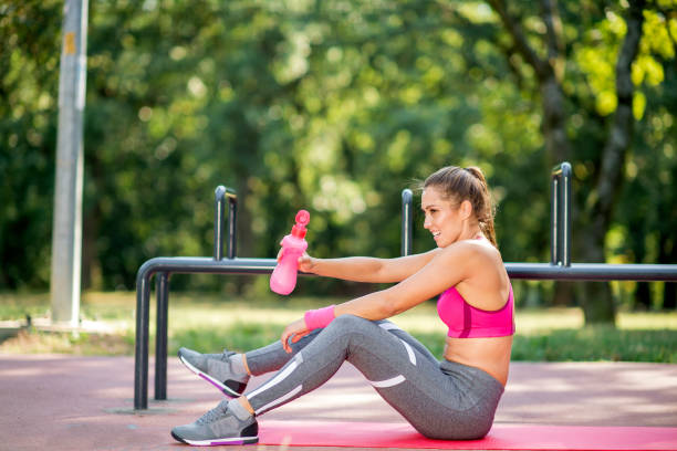 istock Athletic woman training outdoors 1176173694