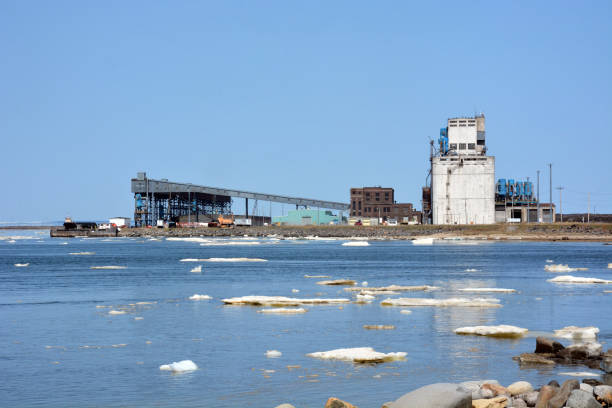 istock Arctic shipping port with ice on water 1176180803