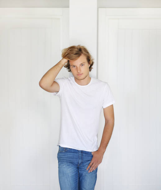 istock Teenager standing near a white wall 1176183368