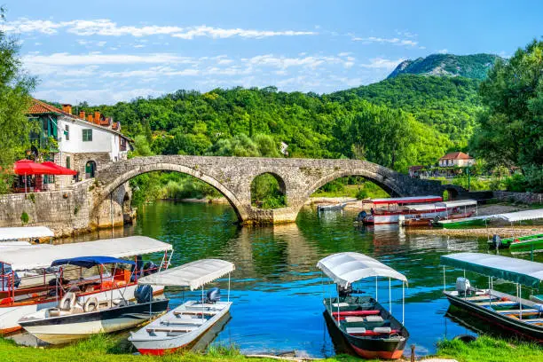 Boats near Stari Most on Crnojevica river in Montenegro