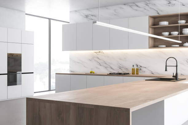 istock White marble kitchen corner with wooden island 1176197803