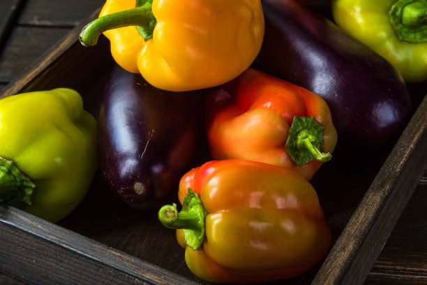 istock Autumn vegetables in a wooden box on a wooden table 1176197891