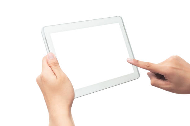 istock Male hand holding the white tablet pc computer and touching with blank screen isolated on white background with clipping path 1176198071