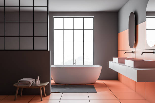 istock Orange and gray bathroom, tub and sink 1176199366